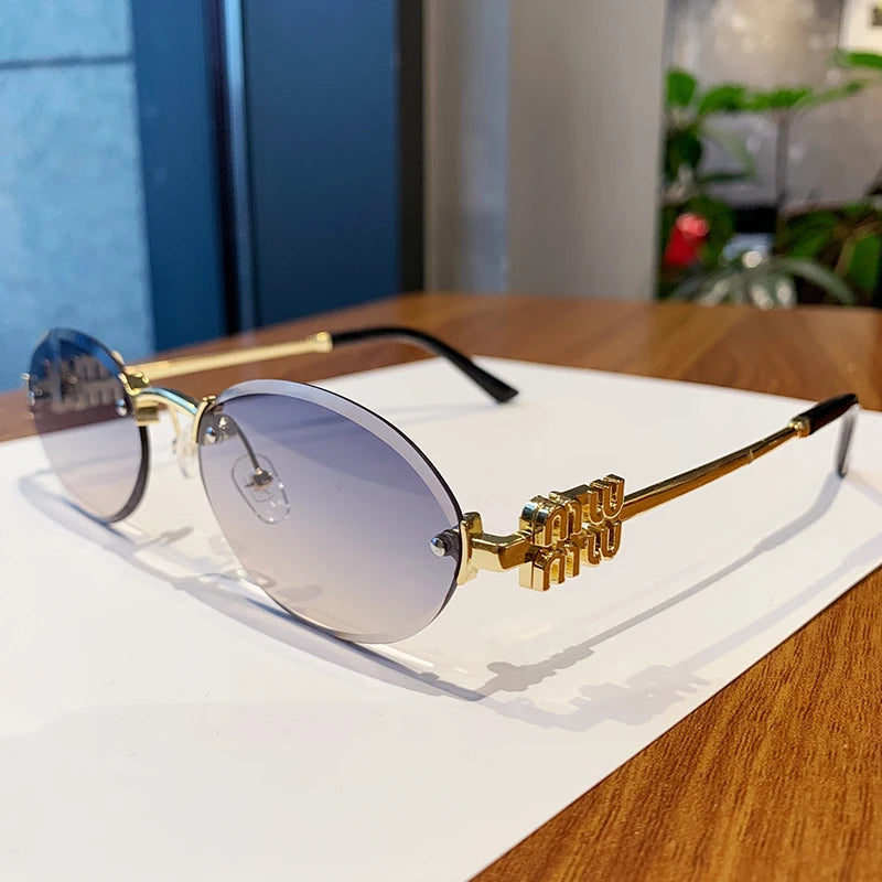 Oval Rimless Cut-Edge Sunglasses