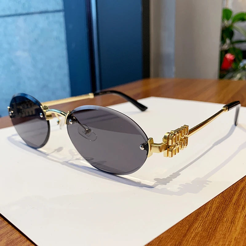 Oval Rimless Cut-Edge Sunglasses